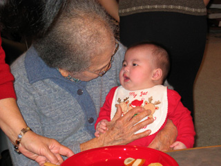 Eleanor with Ah-zho on her first Christmas.