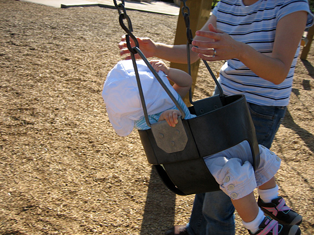 Miranda in the Swing with a Hat