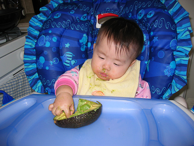 Miranda Eating Avocado