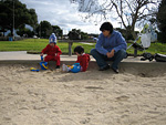 Playing in the Sand at the Park