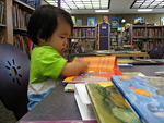 Miranda at the Library