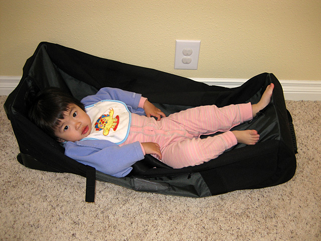 Eleanor Lying on the Duffel Bag