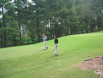 bernard and albert playing golf